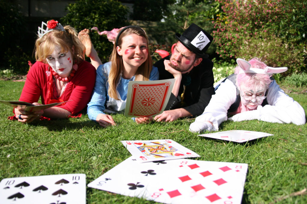 Costumed Characters on Alice Day, organised by the Story Museum. Girls dressed as characters from Alice in Wonderland by Lewis Carroll, a story strongly associated with Oxford.